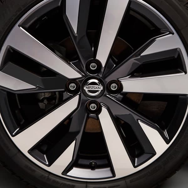 4-pack Nissan Hubcaps / Wheel Hub Emblems - 54mm Silver