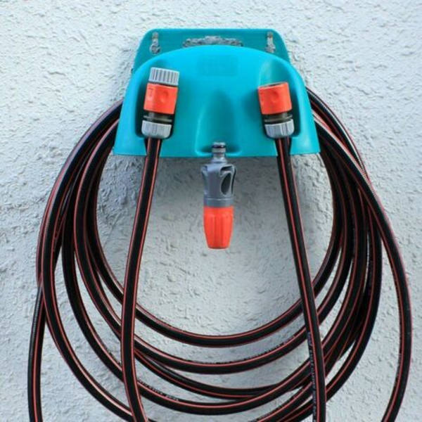 Wall-mounted hose holder, cable holder