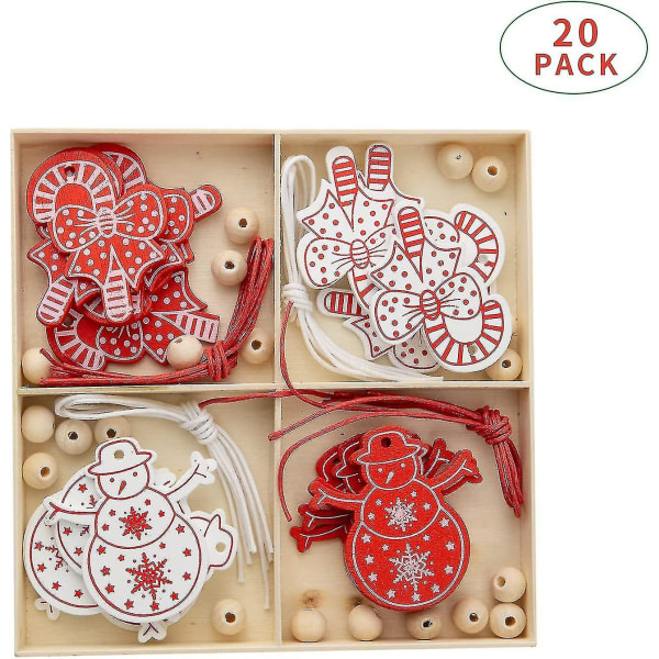Julgranspynt i trä, set med hängande juldekorationer, röda och vita pepparkakor, snögubbar, julgranshängande dekorationer med snöre