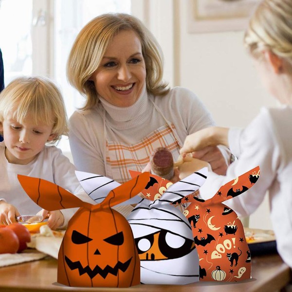 Halloween-muovipusseja, herkkupusseja, temppu-tai-herkku-juhlatarvikkeita, muovipusseja, zombeja