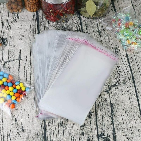 200 transparenta cellofanpåsar i plast med självhäftande förslutning 12 x 18 cm