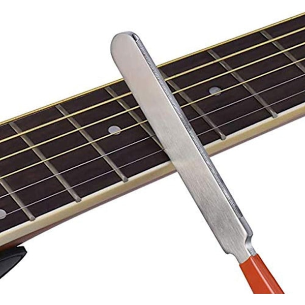 Gitarrverktygsset med 1 st Gitarrfil, 1 st Rostfritt Stål Rocker, 2 st Greppbrädeskydd och 2 st Slipstenar för Gitarr