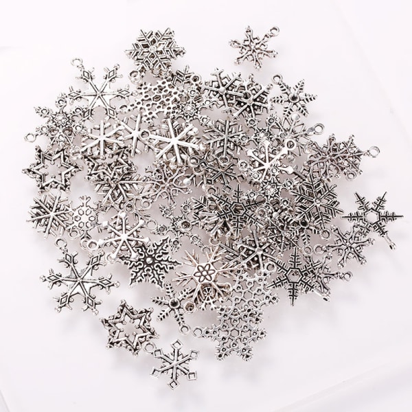 Assortert Snowflake Charms Xmas Pendant for ferie DIY-smykker (100 gram, ca. 90 stk, sølvfarge)