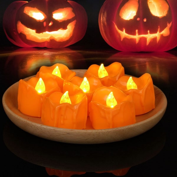 Halloween 12 Pack oranssit teelyhdyt, pienet tippuvat kynttilät, pienet kurpitsalahdut lämpimän valkoisilla polttimoilla, liekettömät, E
