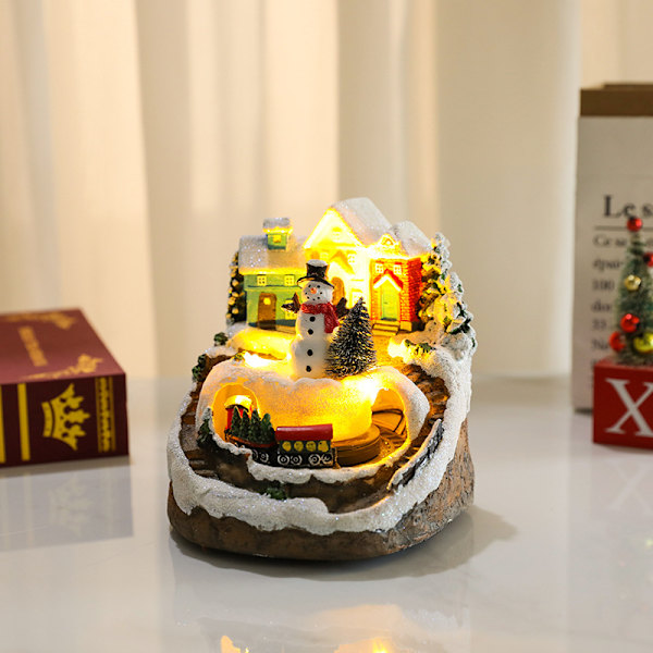 2 st Ljussättande Julgranar i Resin med Snögubbe, Tomte och Resin-Drivna Julbyhus