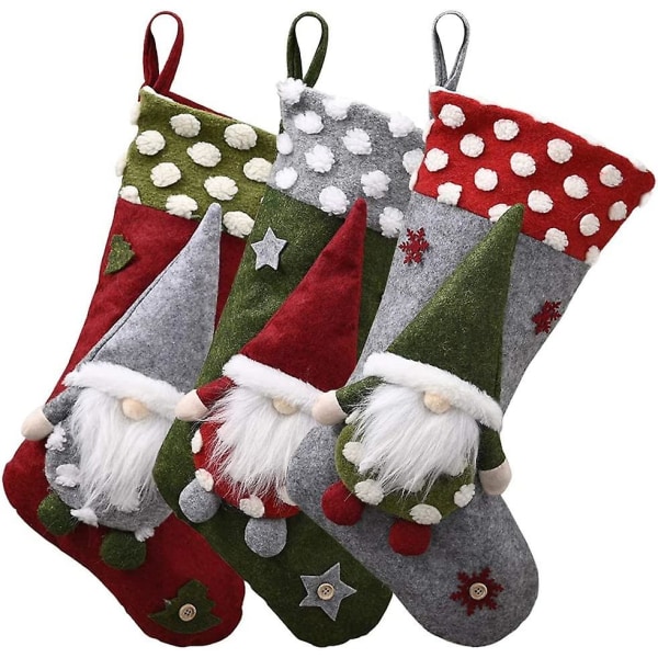 3 pakkauksen joulusukat, isot joulusukat roikkuvat Joulupukin lahjakassi, sarjakuvan joulukoristeet puutakkavitriiniin ja karkkipussi