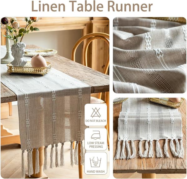 Grå bordløper med håndlagde dusker i lin med uthulet brodert T