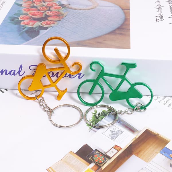 12 kpl pyörän muotoisia pullonavaajia avaimenperä pyörän pullonavaaja