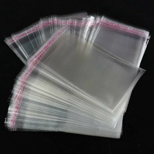 200 transparenta cellofanpåsar i plast med självhäftande förslutning 12 x 18 cm