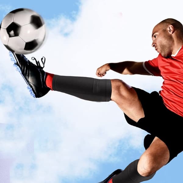 1 par fodboldbenskinner strømper - Sort M
