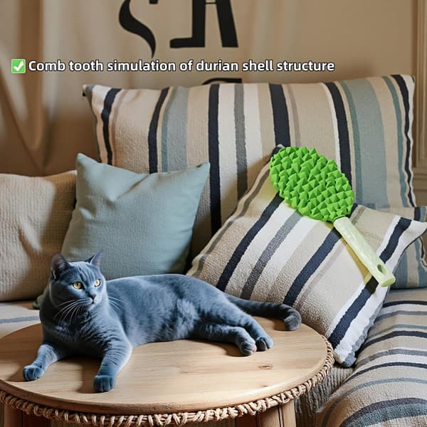 Durian-shaped massage comb for pets, double-sided cat and dog grooming tool, with back tooth scraper, green, 22 cm.