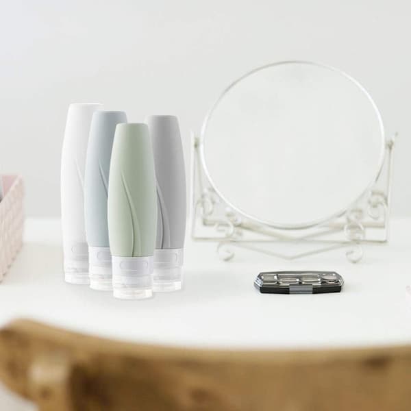 Reiseflasker i silikon, 4-pakning påfyllbare og klembare (60 ml)
