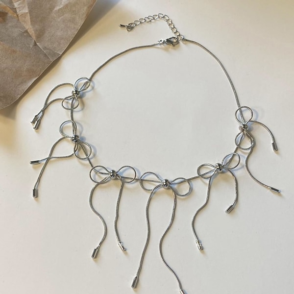 Elegant Metall Bowknot Halsband Trendigt Fjärilsrosett Berlock Halssmycke kompletterar enkelt olika outfits och stilar.