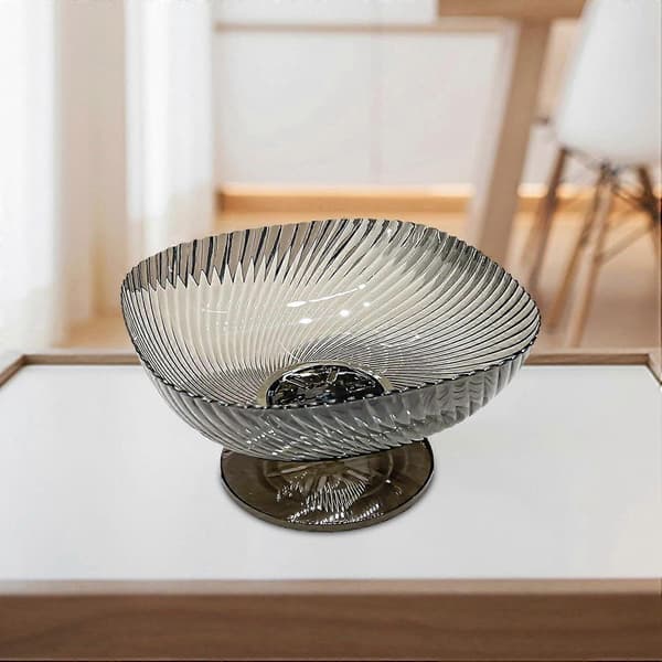 Black fruit bowl with pedestal and drain, large kitchen colander and table decoration