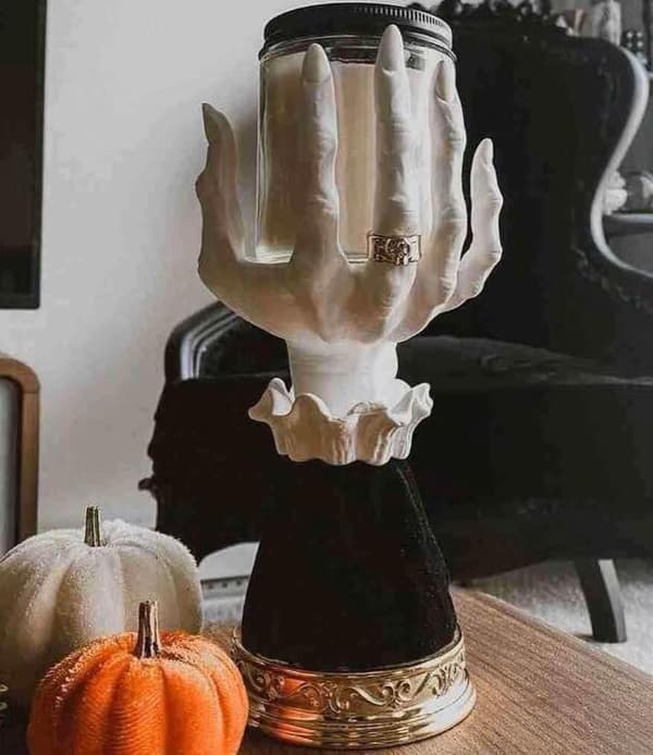 Halloween-heks håndlysestaker i harpiks Hand