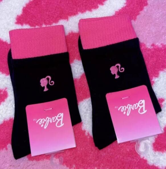 Fire par med rosa midtkalfsokker Four Pairs