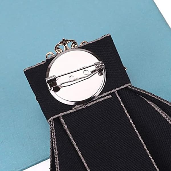 Slips med rosett och strassbrosch Black