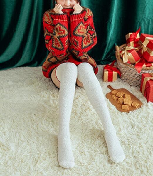 Par af Koralsamt Juleknæstrømper Snowman