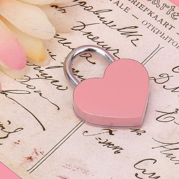 Pakkauksessa 2 suotuisaa 2 kpl sydänlukko avaimella, pieni sydämen muotoinen rakkauslukko, minimetallinen riippulukko