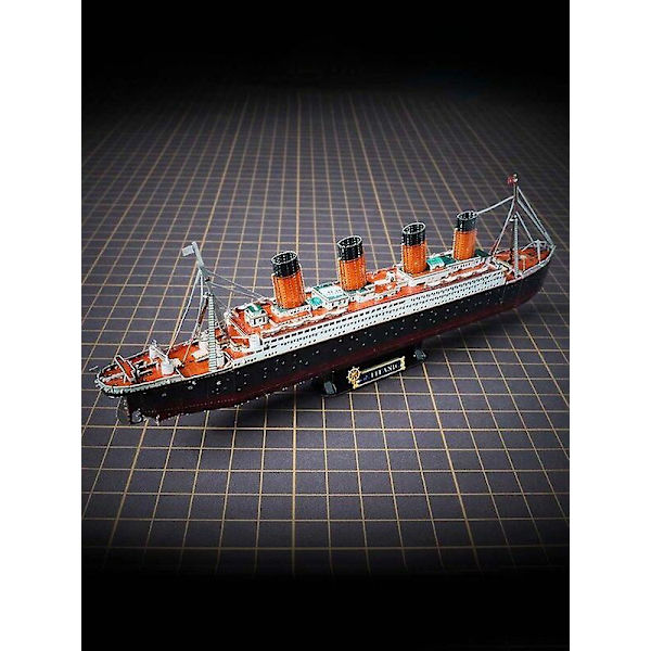 Det er en puslegave av 3D metallpuslespill Titanic modellskip cruisehåndverk barnas pedagogiske puslespill