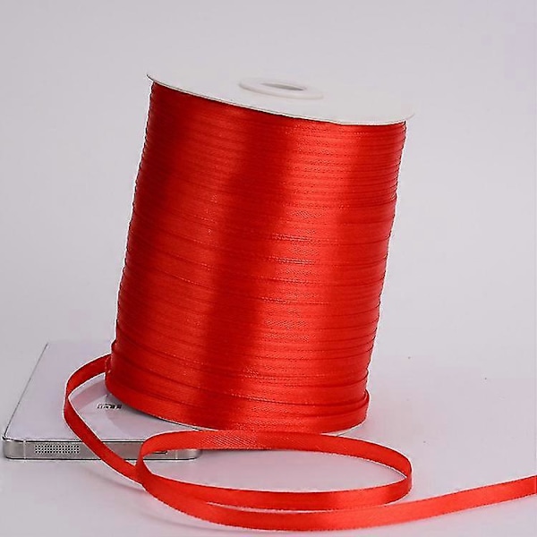 Rött band för presentinslagning (10cm 20m)