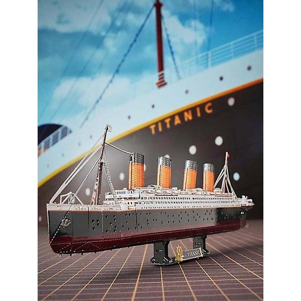 Det er en puslegave av 3D metallpuslespill Titanic modellskip cruisehåndverk barnas pedagogiske puslespill