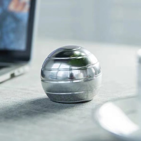 Kinetiska skrivbordsleksaker, helkropps optisk illusion Spinner Ball, presenter för män, kvinnor, barn storlek 2,2" (silver)
