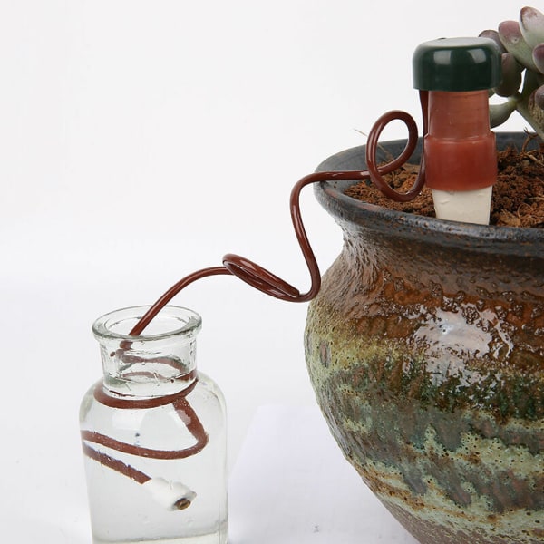 Set med 4 vattenbollar, vattenfontän för växter och blommor, G