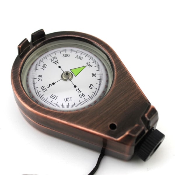 Kompass med fuktet i en væske i en boks laget av solid metall