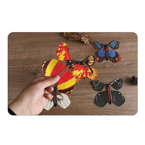 Magisk uppfällbar flygande stor överraskningsgåva fjäril i boken gummibanddriven magisk älva flygande, leksak stor överraskningsgåva (5-pack)