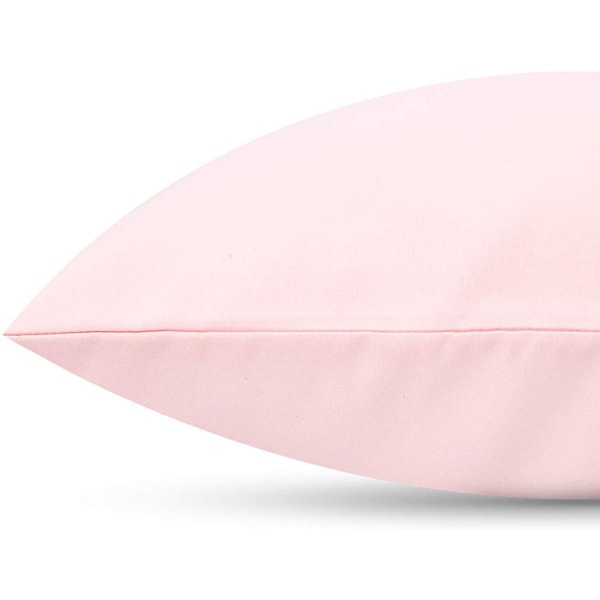 Pari vaaleanpunaista tyynyliinaa yksivärinen harjattu tyynyliina