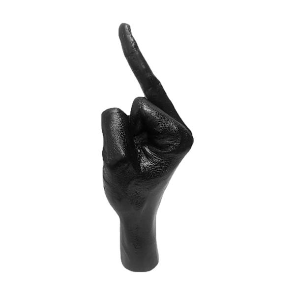 Dekoration för hemmakontor med staty av långfinger