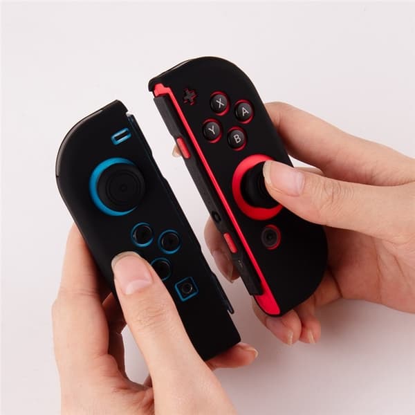 Silikonecover kompatibelt med Nintendo Switch + tommelfingergrebsbeskytter - Sort Black