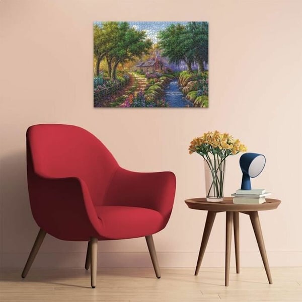 Pussel Ravensburger Cottage By The River