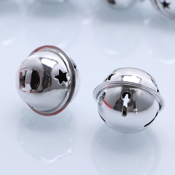 Set med 20 mini julbjällror med stjärnformade utskärningar, guld, 4 cm