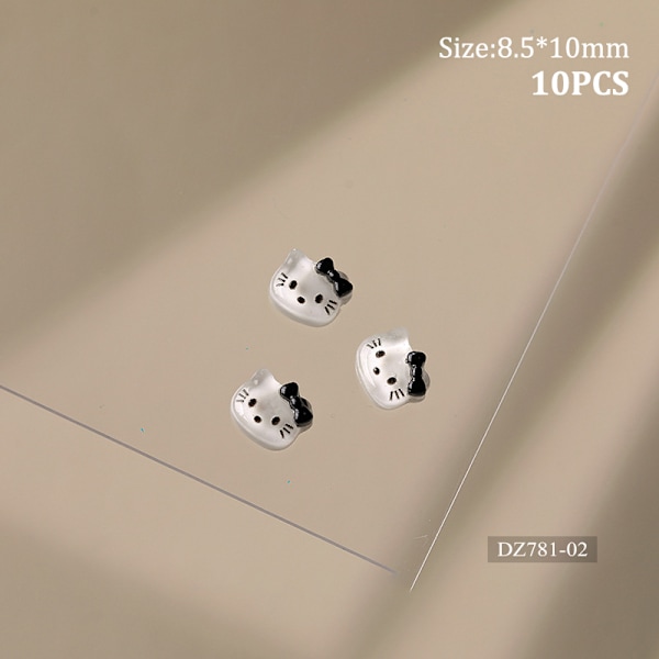 10 kpl Fine Flicker Katie Cat Nail Sarjakuvatarvikkeet Mini Resi DZ781-04