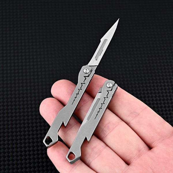 Mini Pullonavaaja Scalpel Titanium Alloy G10 Kahva taitettava O
