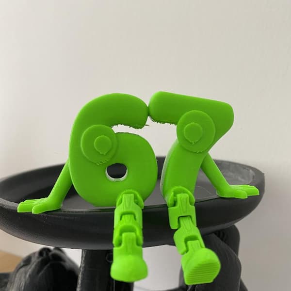 3D-printede artikulerte nummer 67-figurer Fleksible lyse Co A22