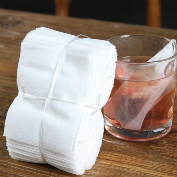 100 stk Non-woven tomme teposer String Heat Seal Filter Paper He 5*7cm