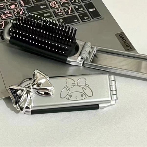Taitettava hiuskampa hiusten muotoilu peili-anime-kannettavalla matkalla A1