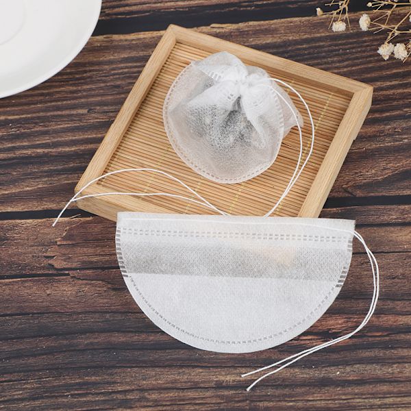 50 kpl Tyhjiä teepusseja sisältävä infusori String Heal Seal Filte -suodattimella