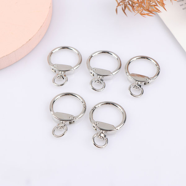 5 kpl Metallipuristinkarabiinijousijousityylinen pyörivät avaimenperät Silver