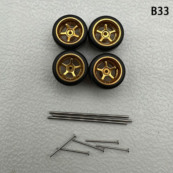 1 Set 1/64 modellbilhjul med gummidäck Modifierade delar Ve B33 10Claws Gold