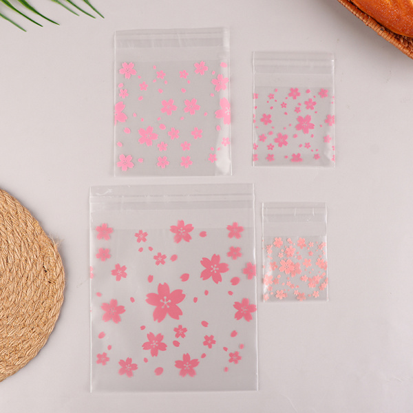 100 Stk Plast Transparent Gavepose Sakura Candy Cookie Self Ad S