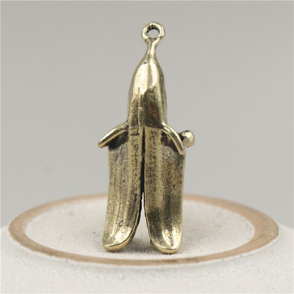 Retro mässing Banana Man Creative Keychain Pendant Desktop Orname