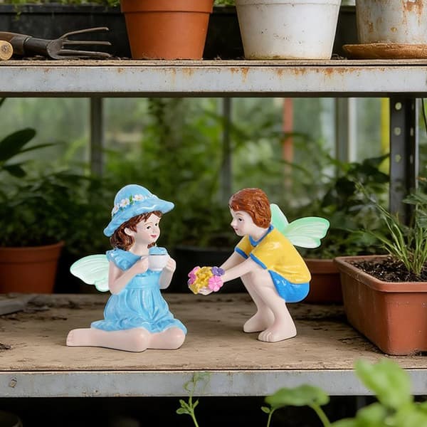 2 stk morsom fe-gutt og -jente statue