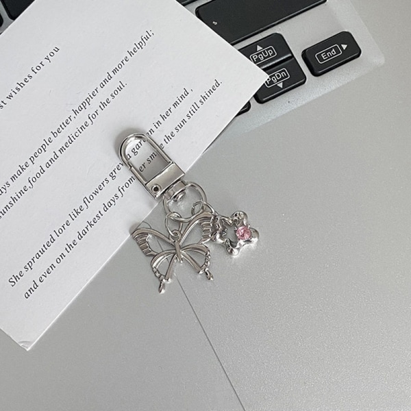 Cross Keychain Creative pyörivä reppuriipus Silver-A1