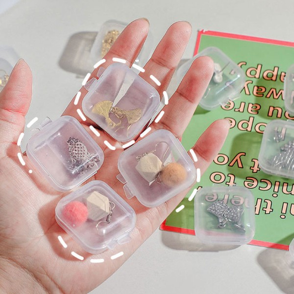 10 kpl Pienet laatikot Neliönmuotoiset läpinäkyvät korvakorut Muovilaatikko