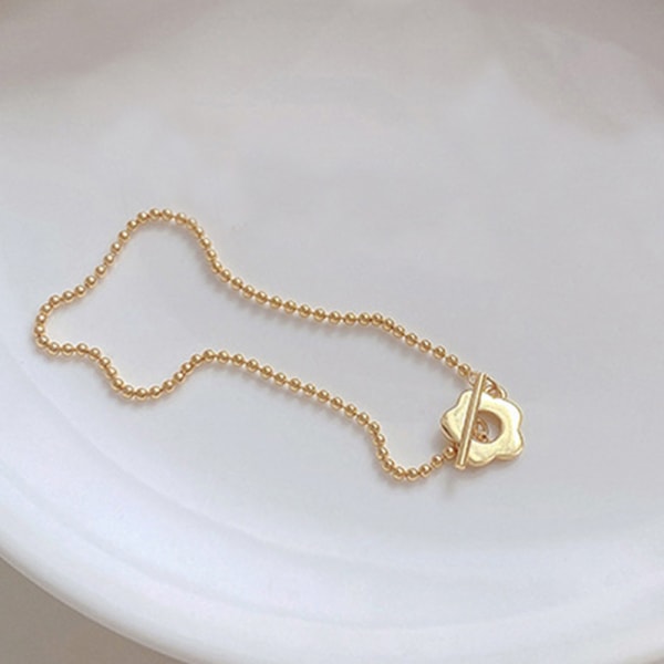 1 st modelegering ihålig blomma stålkula OT spänne armband