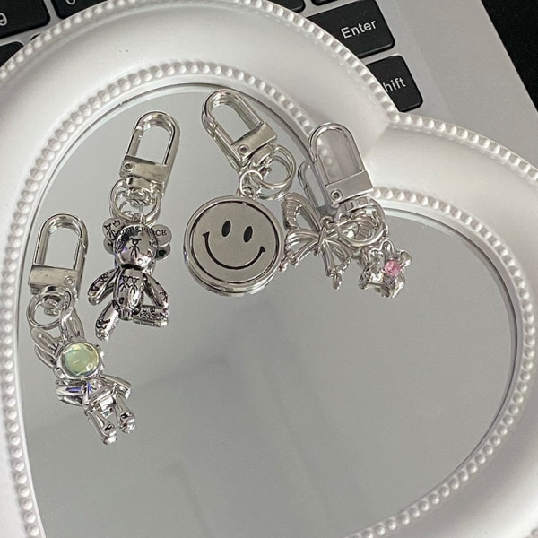 Cross Keychain Creative pyörivä reppuriipus Silver-A8
